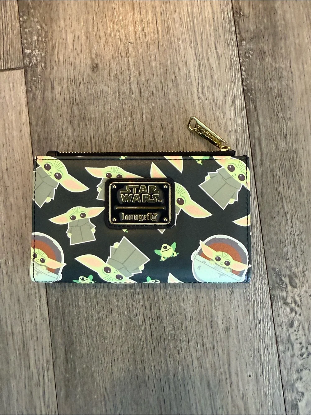 Cute and collectible Loungefly Star Wars Baby Yoda (Grogu) wallet.